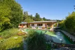 Exklusiver Bungalow in Sonnenlage mit Schwimmteich